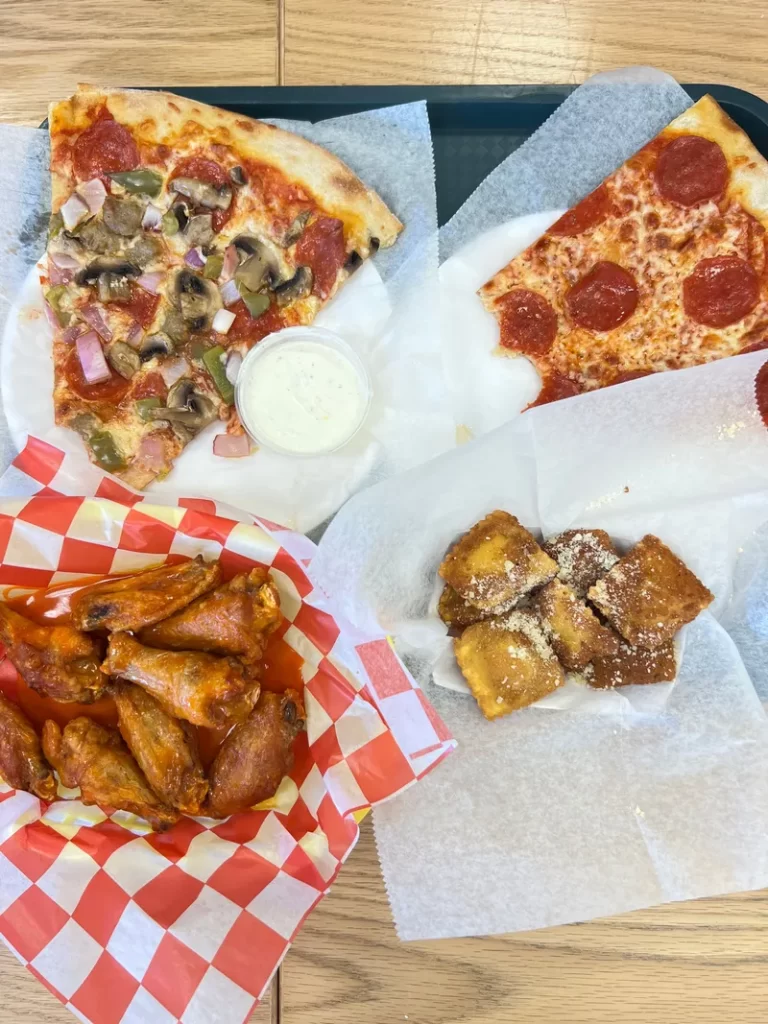 affordable pizza - The Pizza Place - an assortment of pizza, wings and garlic knots